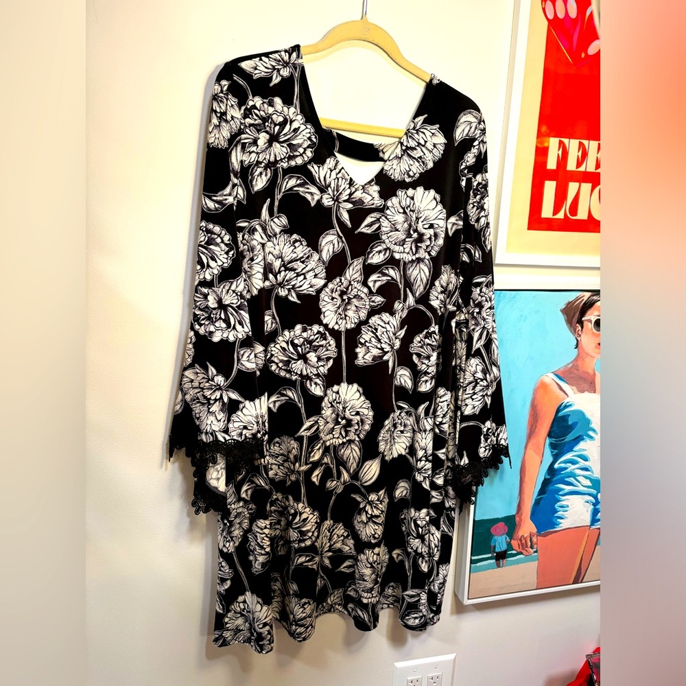 Swing dress with stretch, bell sleeves and lace trim!